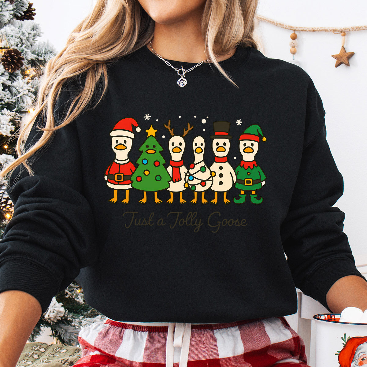 Sweatshirt featuring a Christmas-themed DTF transfer.