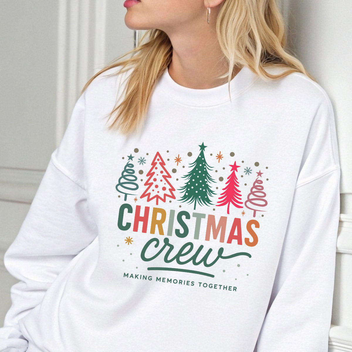Sweatshirt featuring a Christmas-themed DTF transfer.