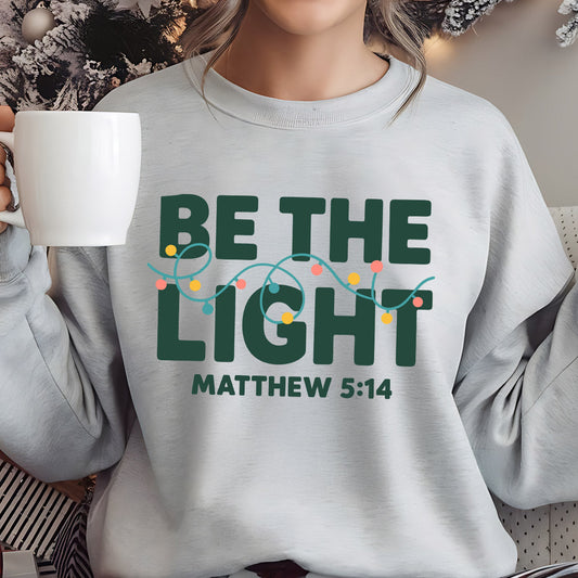Sweatshirt featuring a Christmas-themed DTF transfer.