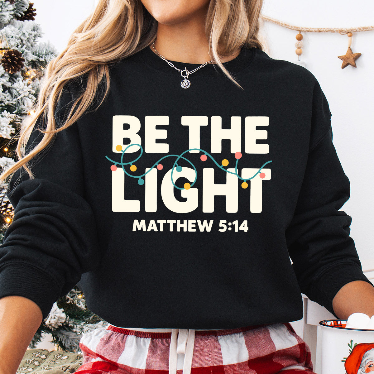 Sweatshirt featuring a Christmas-themed DTF transfer.