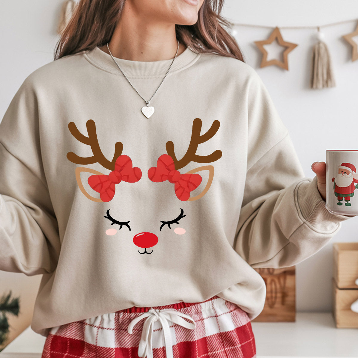 Sweatshirt featuring a Christmas-themed DTF transfer.