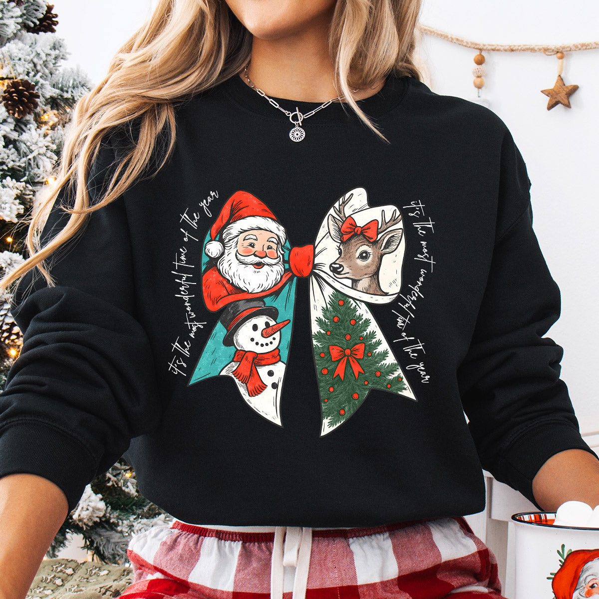 Sweatshirt featuring a Christmas-themed DTF transfer.