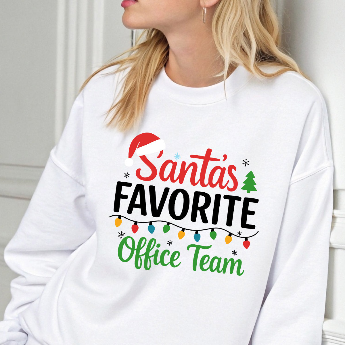 Sweatshirt featuring a Christmas-themed DTF transfer.