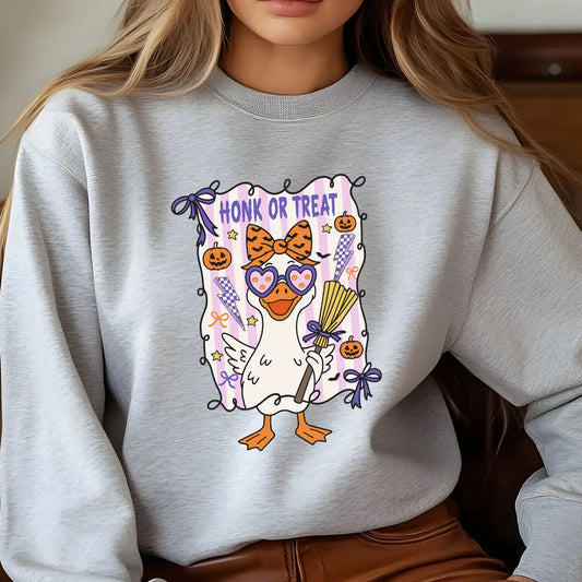 Sweatshirt featuring a Christmas-themed DTF transfer.