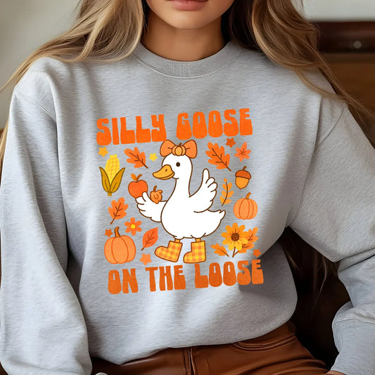Sweatshirt featuring a Christmas-themed DTF transfer.