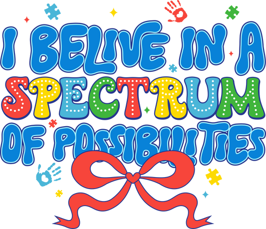 Colorful “I Believe in a Spectrum of Possibilities” DTF transfer design featuring autism awareness symbols like puzzle pieces and a red heart ribbon.