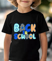 Black T-shirt with colorful “Back to School” text in checkered and star-patterned letters.