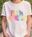 White T-shirt with colorful “Fifth Grade” DTF transfer design in big, bright bubble letters and flower accents.