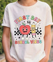 White T-shirt with “First Day of School Vibes” DTF transfer design featuring cute cartoon apple and pencil characters on a black checkerboard background.
