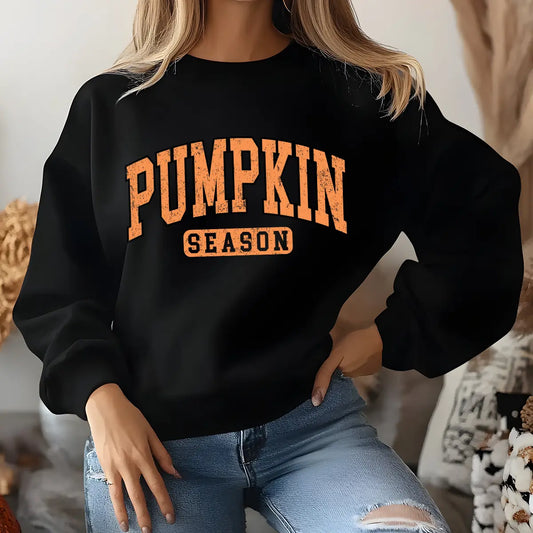 Black sweatshirt with bold orange “Pumpkin Season” lettering DTF transfer design, perfect for cozy fall and autumn-themed custom apparel.