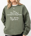 Military green sweatshirt with white script text “See. This is why I wanted to stay home. This. All this. Right here.” Funny DTF transfer design, ideal for humorous apparel.