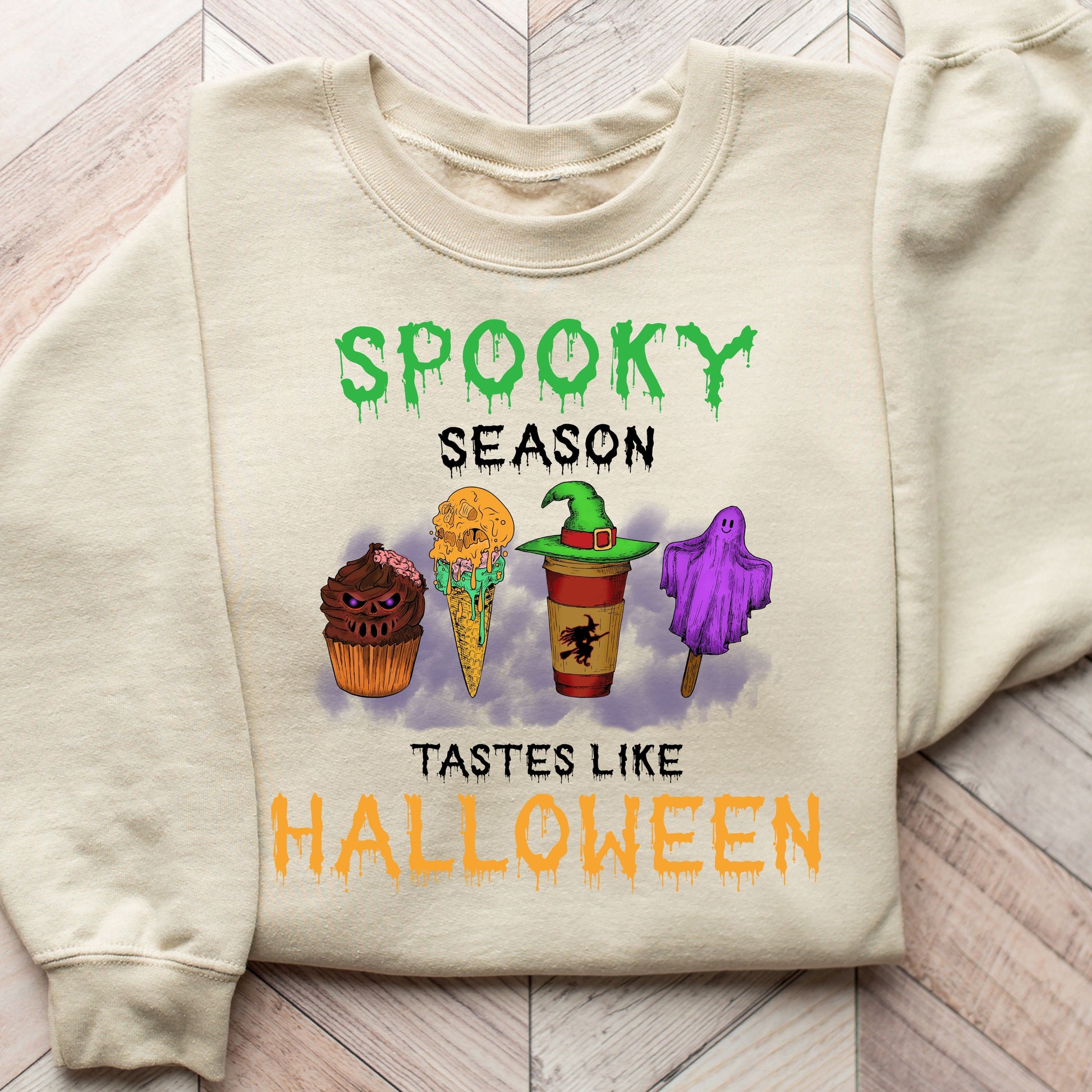 Halloween-themed DTF transfer with cupcakes, ice cream, and pumpkin spice latte design