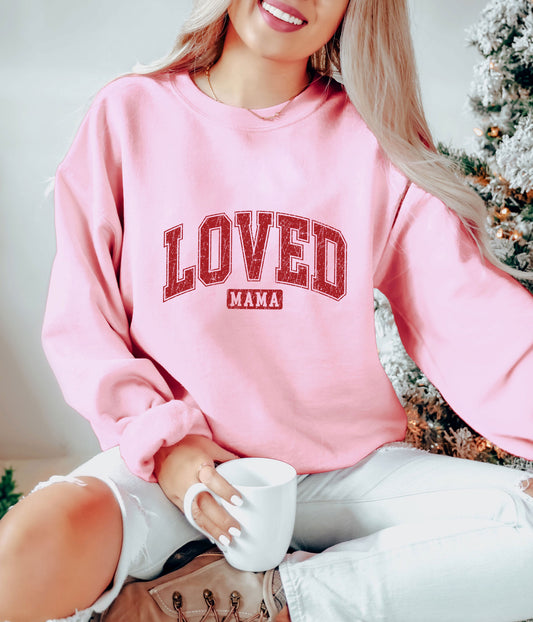 "LOVED Mama" ready-to-press DTF transfer design on a pink sweatshirt