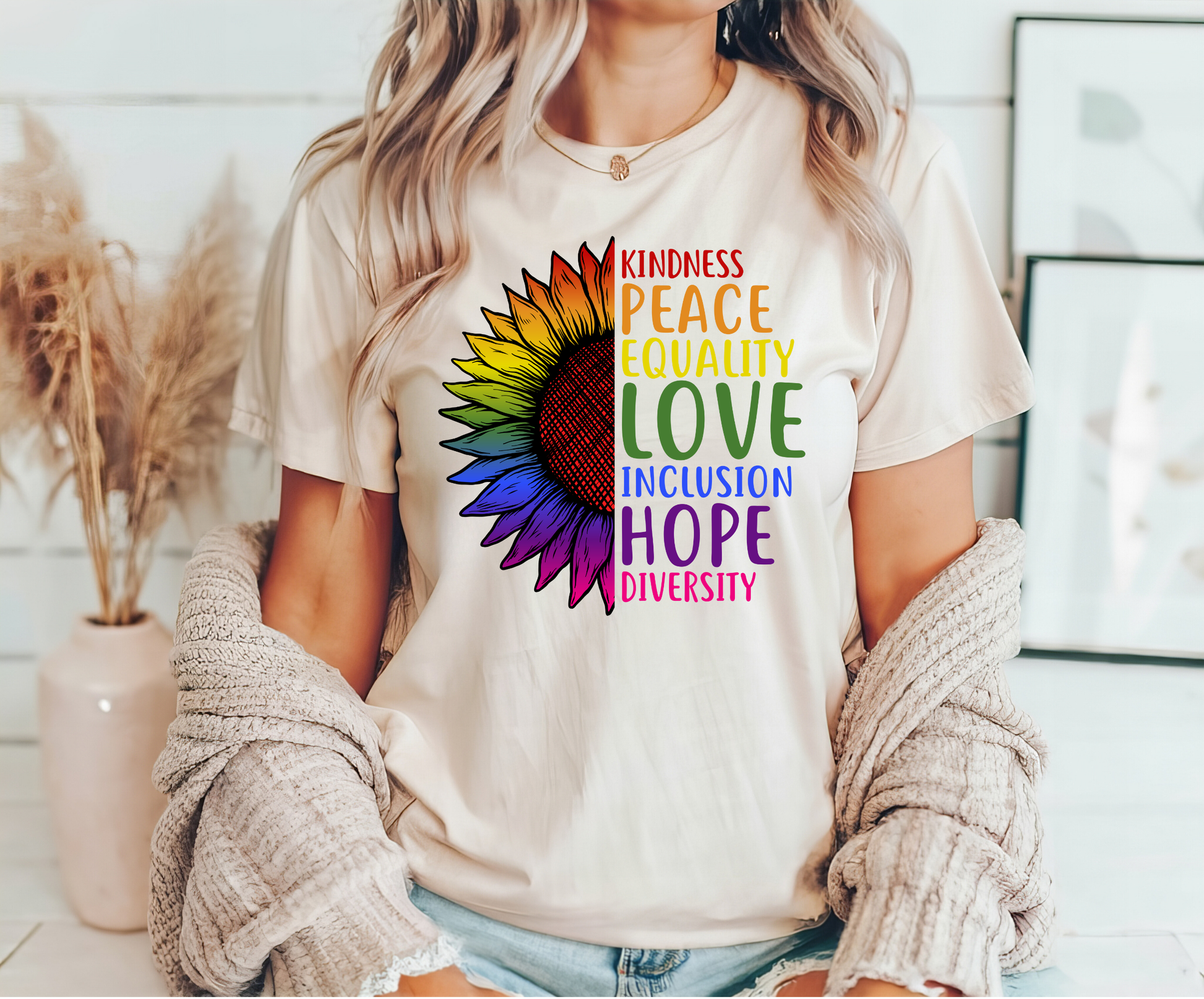 "Kindness Peace Equality Love" DTF transfer design on a white t-shirt featuring a colorful sunflower and uplifting words.