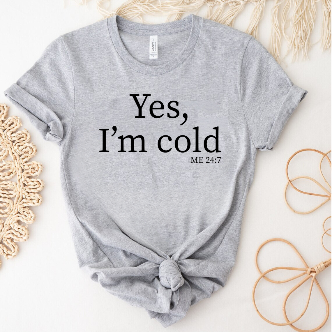 "Yes, I'm Cold" DTF transfer design on a gray t-shirt featuring minimalist black text with a humorous "ME 24:7" reference.