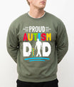 Green sweatshirt with 'Proud Autism Dad' text and graphic. Autism Dad PNG DTF Trasnefr design, Proud Autism Dad, Autism Awareness DTF Shirt Design, Father's Day DTF.