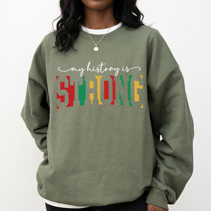 Shirt featuring a Black History-themed DTF transfer. My History is Strong text design.