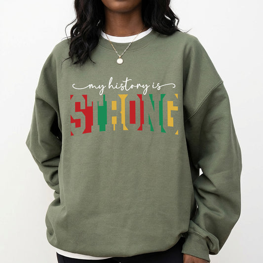 Shirt featuring a Black History-themed DTF transfer. My History is Strong text design.