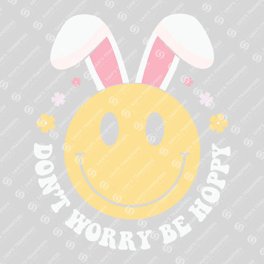 Apparel featuring a Don't Worry Be Hoppy Bunny Smiley-themed DTF transfer.