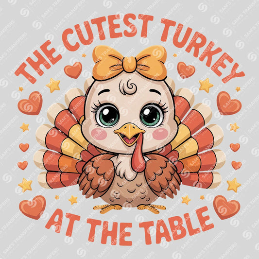 Apparel featuring a The Cutest Turkey at the Table-themed DTF transfer.