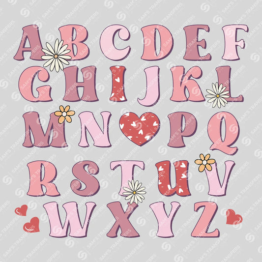 Apparel featuring a Valentine Alphabet-themed DTF transfer.