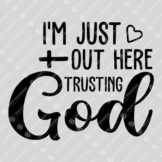 Apparel featuring a Im Just Out Here Trusting God Cross-themed DTF transfer.