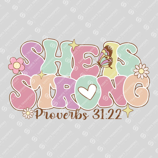Apparel featuring a She Is Strong-themed DTF transfer.
