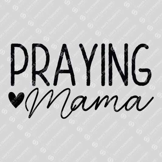 Apparel featuring a Praying Mama-themed DTF transfer.