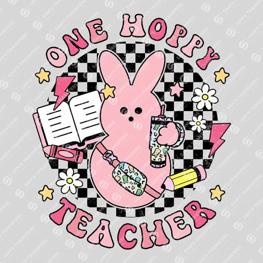 Apparel featuring a One Hoppy Teacher-themed DTF transfer.
