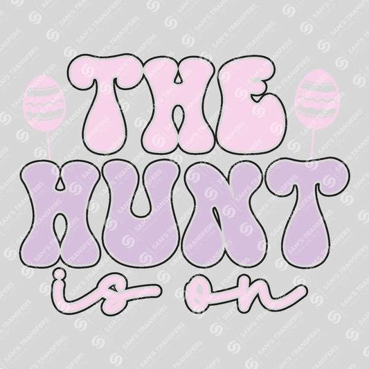 Apparel featuring a The Hunt Is On-themed DTF transfer.