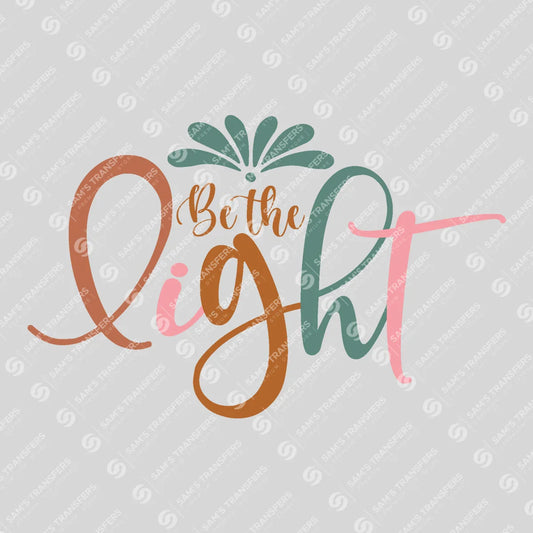 Apparel featuring a Be the Light-themed DTF transfer.