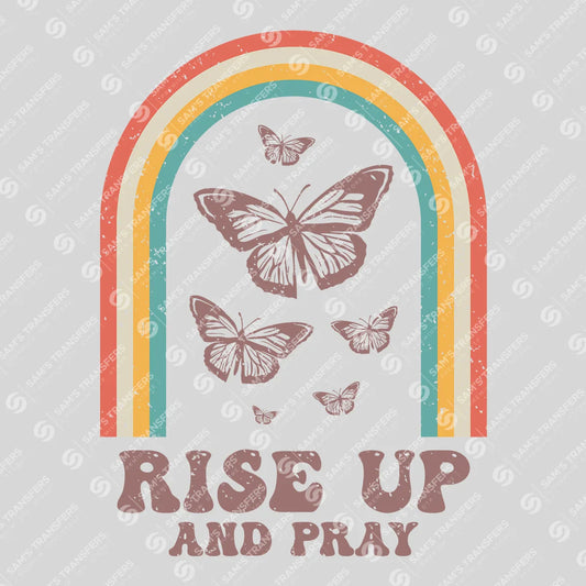 Apparel featuring a Rise Up and Pray-themed DTF transfer.