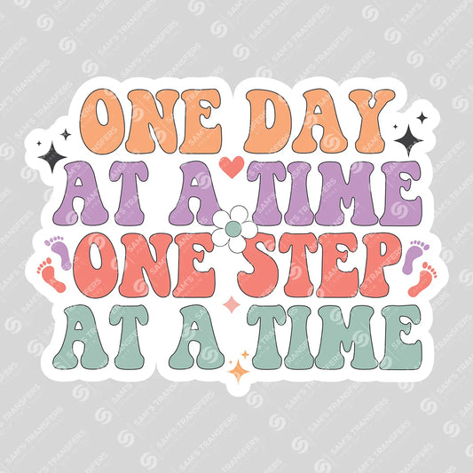 Apparel featuring a One Day at a Time One Step at a Time-themed DTF transfer.