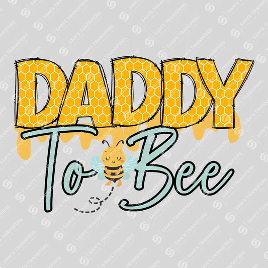 Apparel featuring a Daddy To Bee-themed DTF transfer.