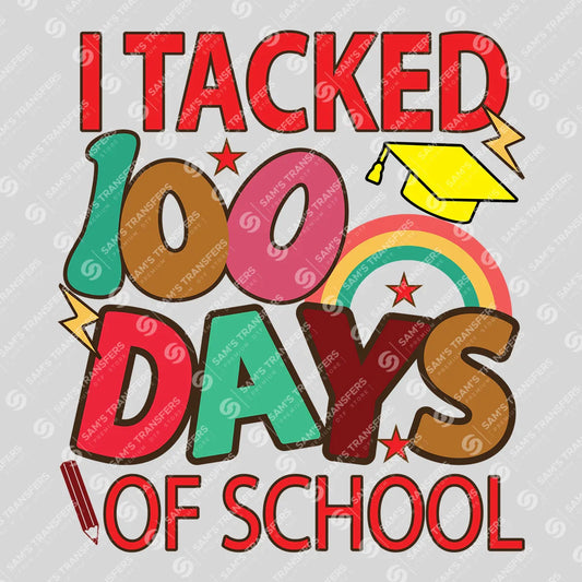 Apparel featuring a I Tackled 100 Days Of School-themed DTF transfer.