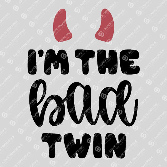 Apparel featuring a I'm the Bad Twin-themed DTF transfer.