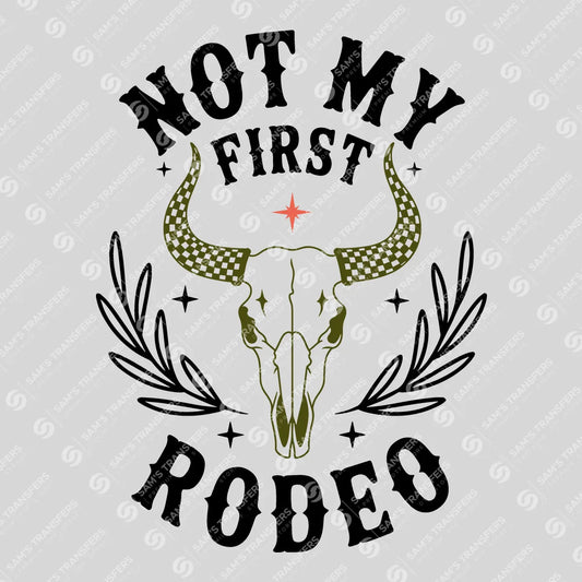 Apparel featuring a Not My First Rodeo-themed DTF transfer.