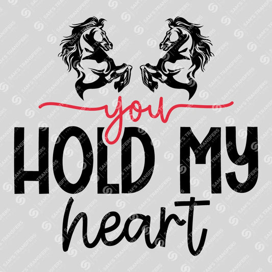 Apparel featuring a You Hold My Heart-themed DTF transfer.