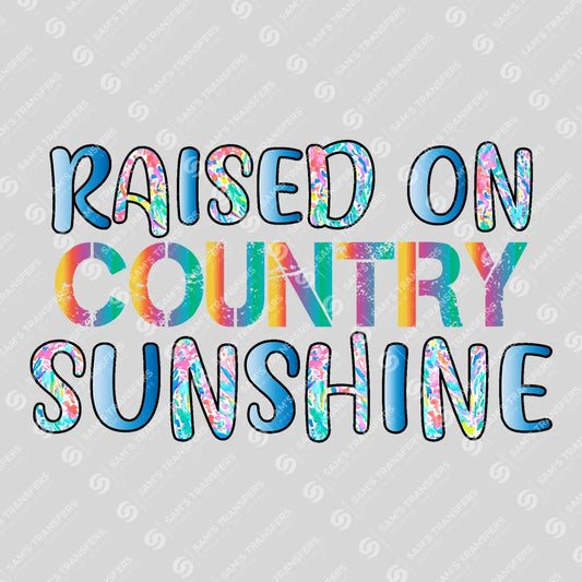 Apparel featuring a Raised on Country Sunshine-themed DTF transfer.