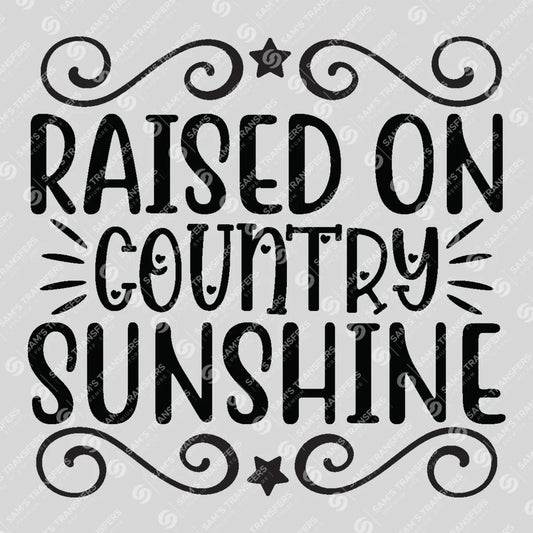 Apparel featuring a Raised on Country Sunshine-themed DTF transfer.