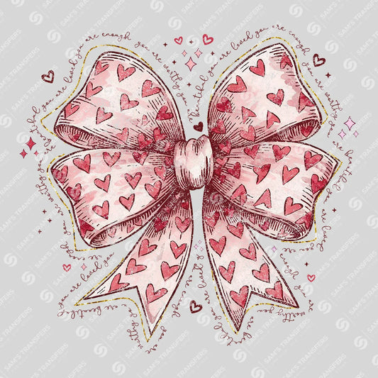 Apparel featuring a Valentine Heart Bow-themed DTF transfer.