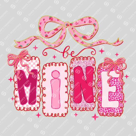 Apparel featuring a Be Mine-themed DTF transfer.