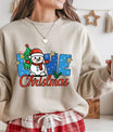 Beige sweatshirt with “Love Christmas” DTF transfer design featuring a snowman in a Santa hat, Christmas tree, stars, and snowflakes—perfect for festive apparel.