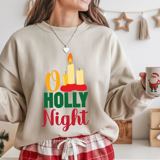 Sand-colored sweatshirt with “O Holy Night” text and candle design in red, gold, and green – elegant Christian Christmas apparel.