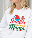 White sweatshirt with “Santa’s Favourite Mama” text featuring a Santa hat, gingerbread man, and stars in red, green, and yellow colors.