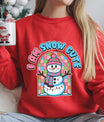 Red sweatshirt with cute snowman graphic and text “I Am Snow Cute” in blue and pink letters.