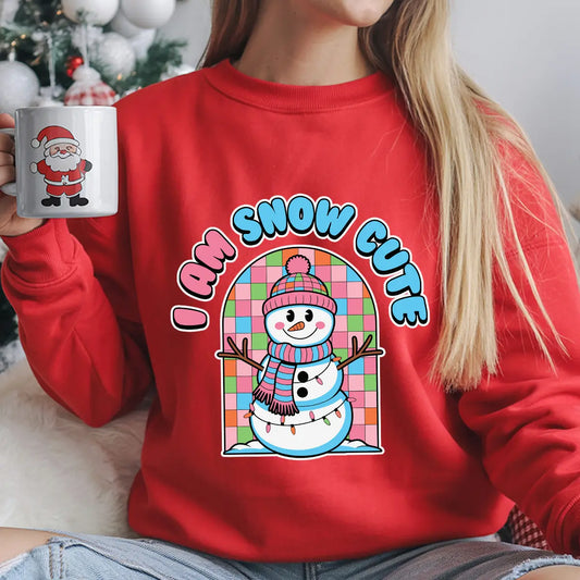 Red sweatshirt with cute snowman graphic and text “I Am Snow Cute” in blue and pink letters.