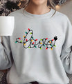 Gray sweatshirt with “love” written in Christmas light string design featuring multicolor bulbs.