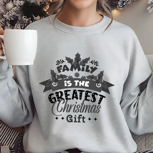 Gray Christmas sweatshirt with “Family Is the Greatest Christmas Gift” DTF design in festive typography and holly leaf details.