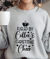 Grey sweatshirt with “Fueled by Coffee & Christmas Cheer” DTF design featuring a steaming coffee cup and stars.